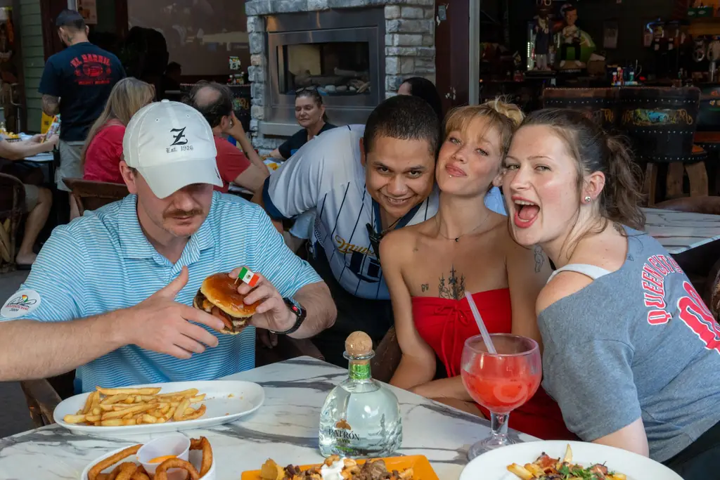 Friends laughing at the table