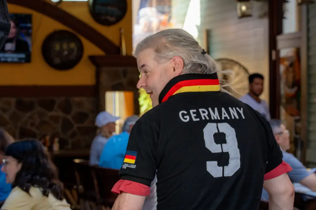 A regular in a Germany soccer jersey in the Mt Adams bar room