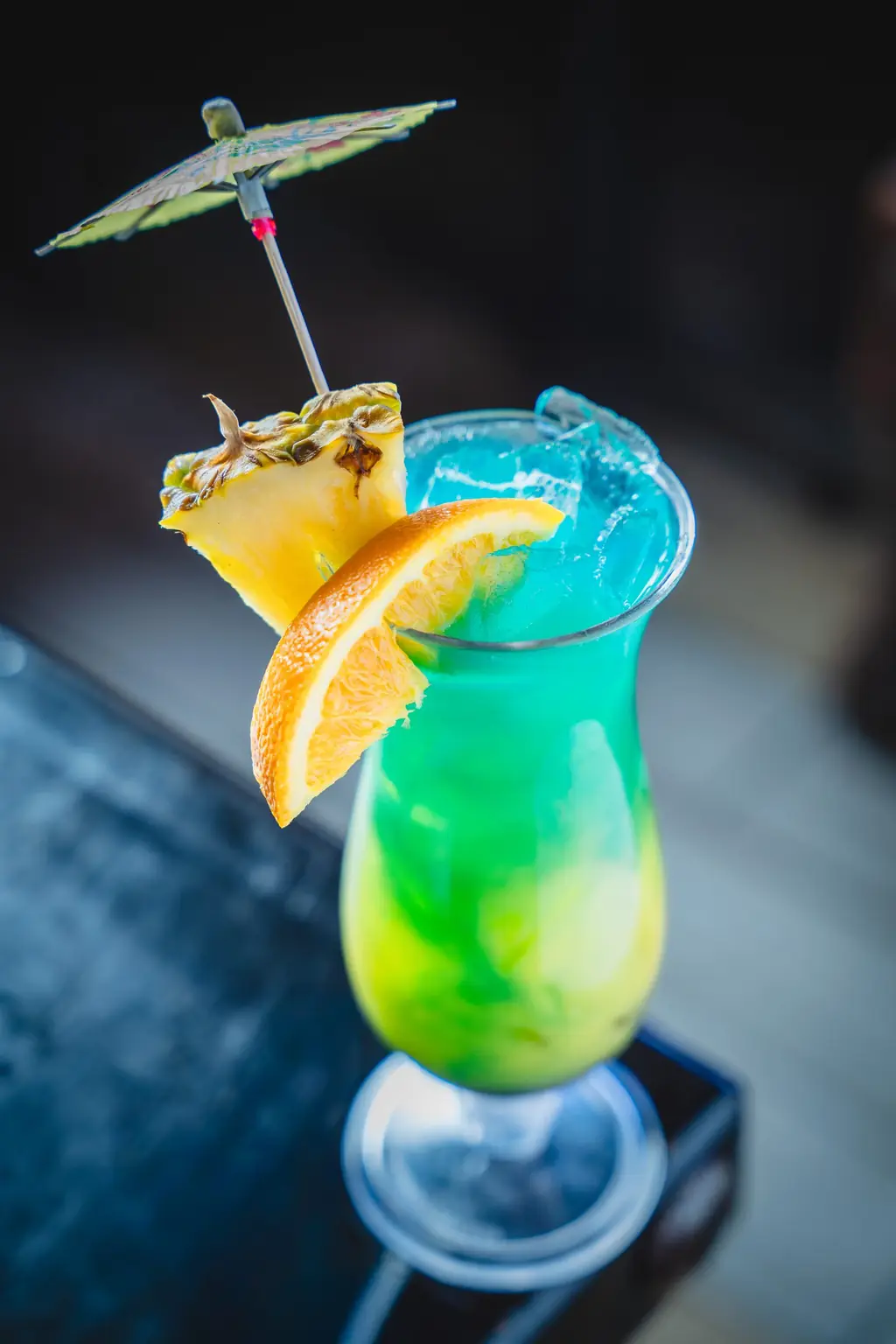 El Barril Tropical cocktail with pineapple and an umbrella
